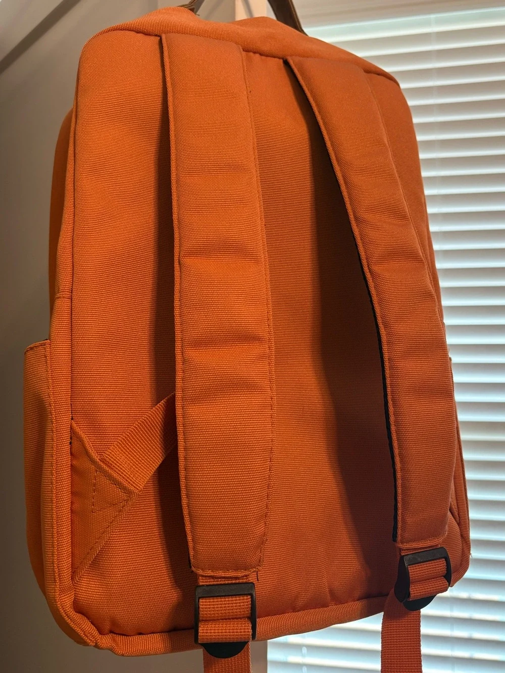 Orange Canvas Backpack with Brown Accents